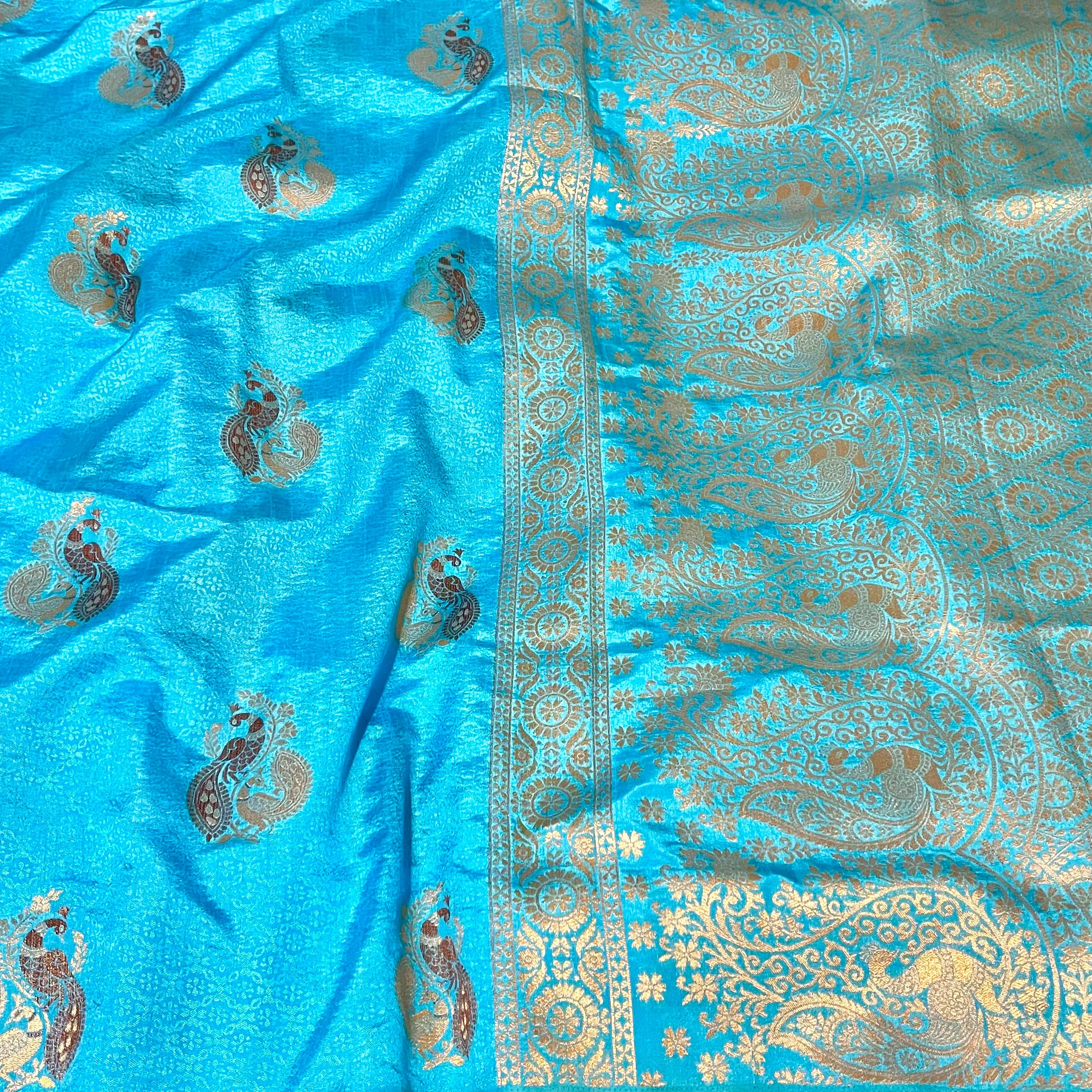 Blue Peacock Motif Borderless Semi Soft Silk Saree