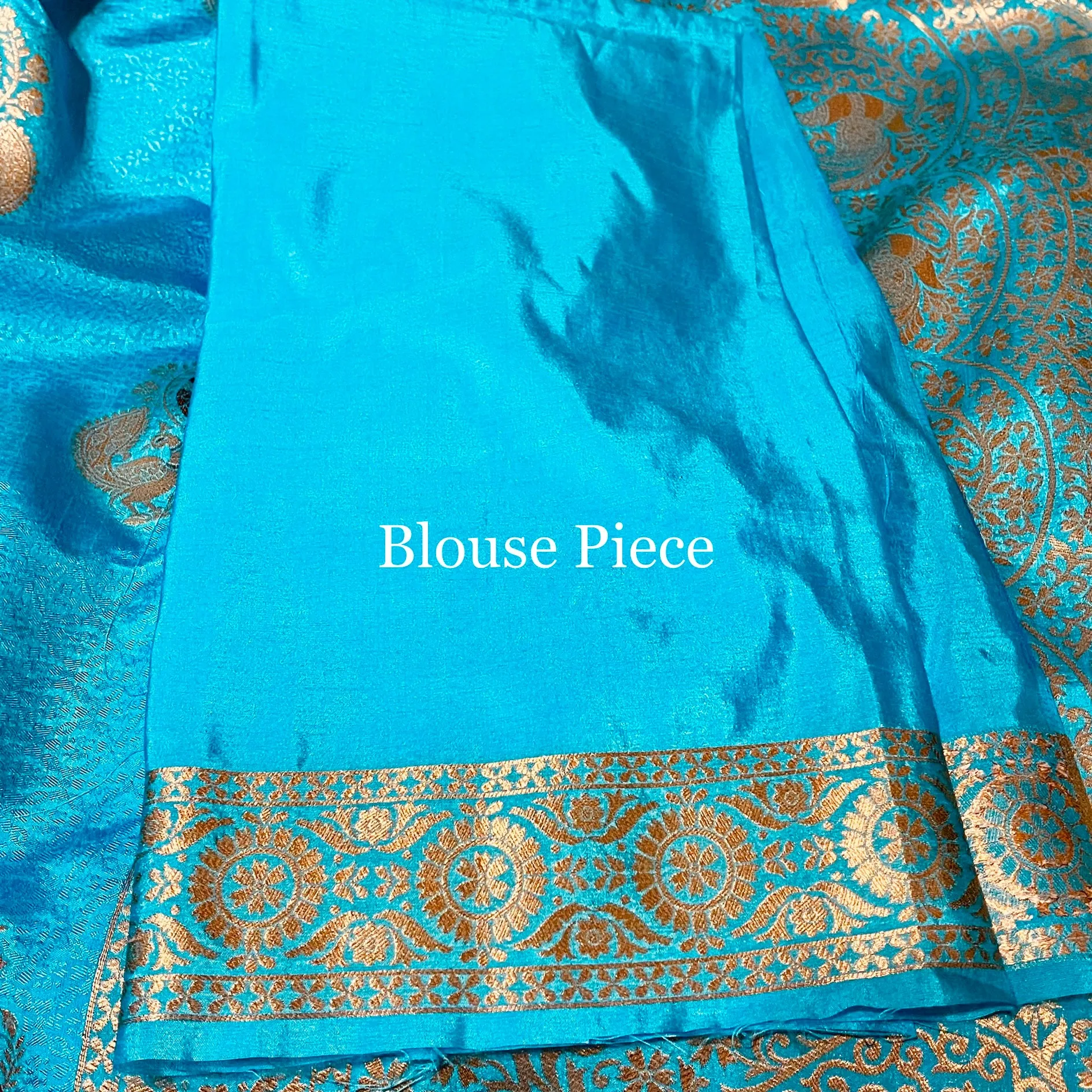 Blue Peacock Motif Borderless Semi Soft Silk Saree